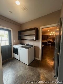 64 Crescent, Ardmore, OK 73401 - kitchen featuring washer and clothes dryer and open shelves