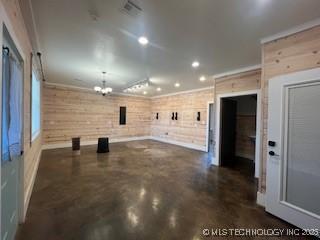 64 Crescent, Ardmore, OK 73401 - empty room with recessed lighting, concrete flooring, and a chandelier