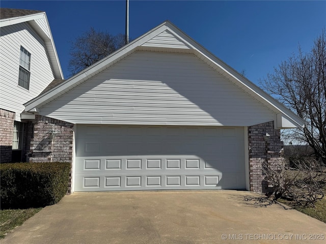 garage with driveway