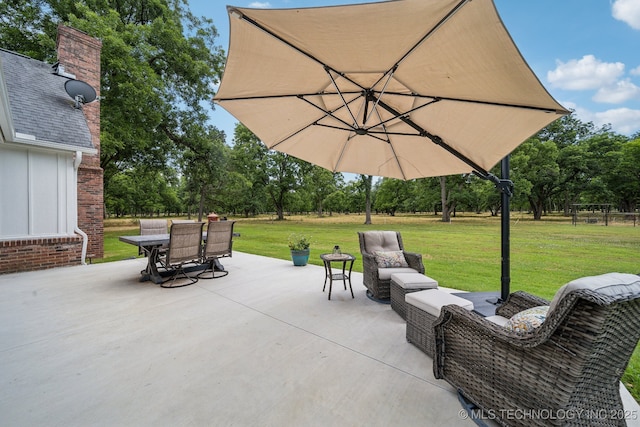 view of patio with outdoor dining area