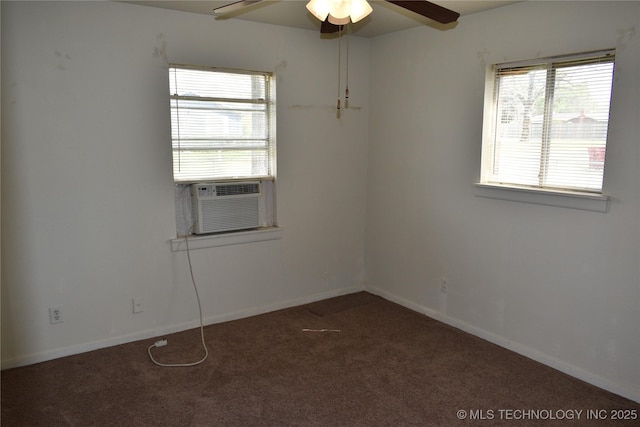 carpeted spare room with cooling unit, ceiling fan, and baseboards