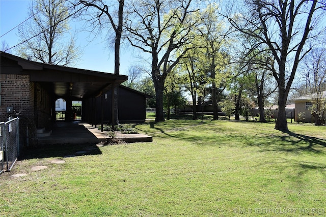 view of yard featuring fence