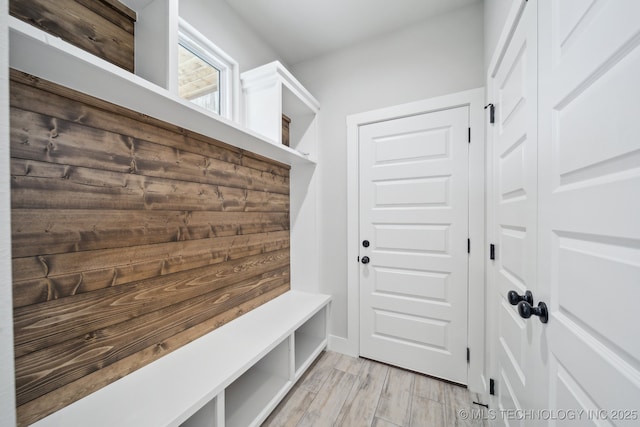 mudroom featuring light wood-style floors