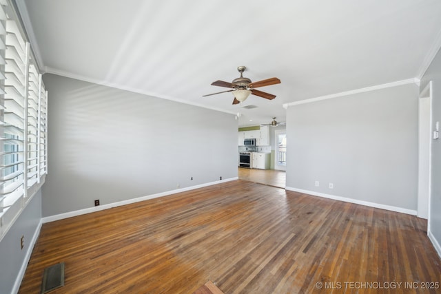 unfurnished living room featuring hardwood / wood-style floors, crown molding, and visible vents