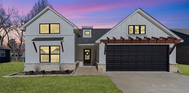 317 SE 6th St, Pryor, OK 74361 - modern inspired farmhouse featuring driveway, a shingled roof, board and batten siding, and stone siding