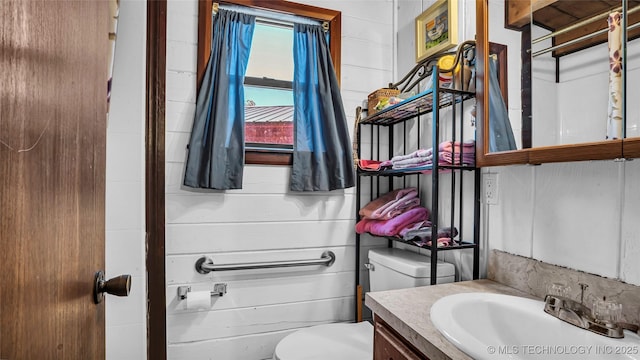 half bath with toilet and vanity