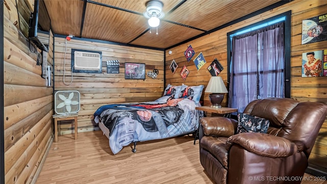 bedroom with wooden ceiling, log walls, wood finished floors, and a wall mounted AC