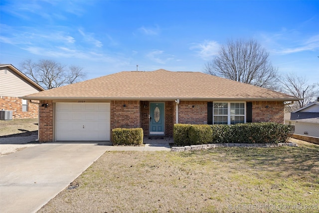 single story home featuring a garage, concrete driveway, brick siding, and roof with shingles