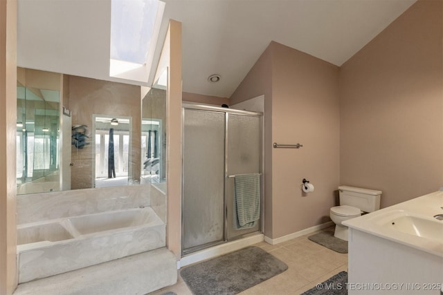 bathroom featuring tile patterned flooring, a garden tub, toilet, a shower stall, and vaulted ceiling