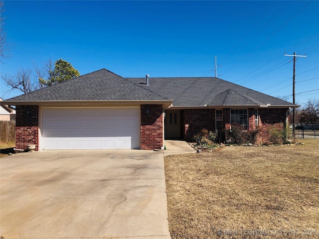 ranch-style home featuring roof with shingles, fence, concrete driveway, and brick siding