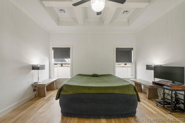 bedroom with a towering ceiling, light wood-type flooring, coffered ceiling, and visible vents