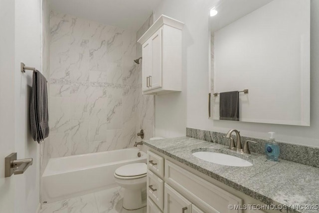 full bathroom featuring marble finish floor, shower / bath combination, vanity, and toilet