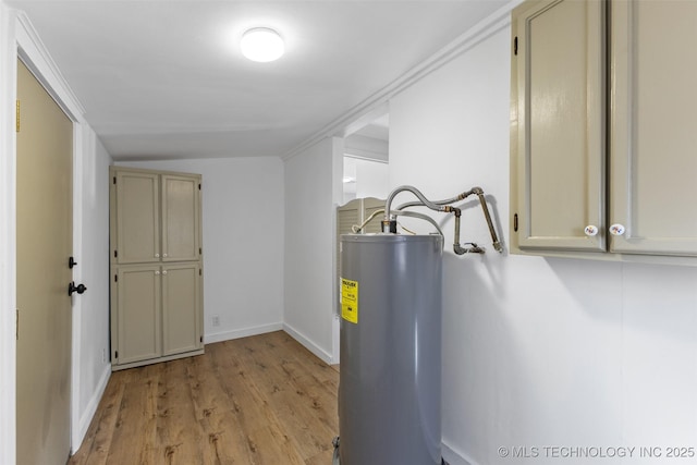 utility room featuring water heater