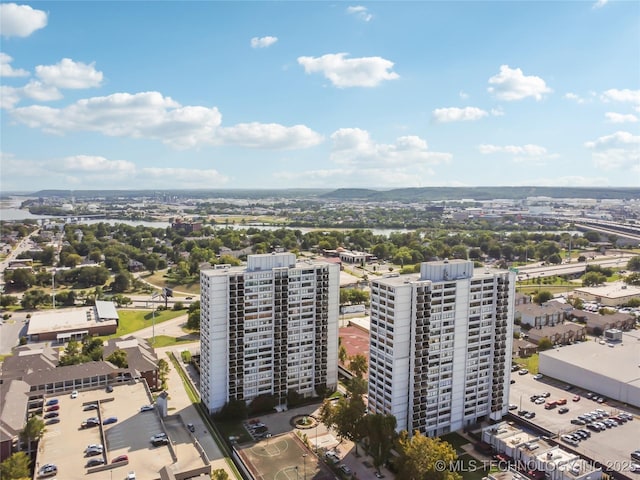 birds eye view of property with a view of city