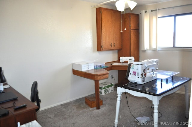 office space with carpet flooring and baseboards