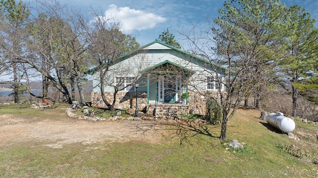 3126 E 490th Rd, Pryor, OK 74361 - view of home's exterior with stone siding