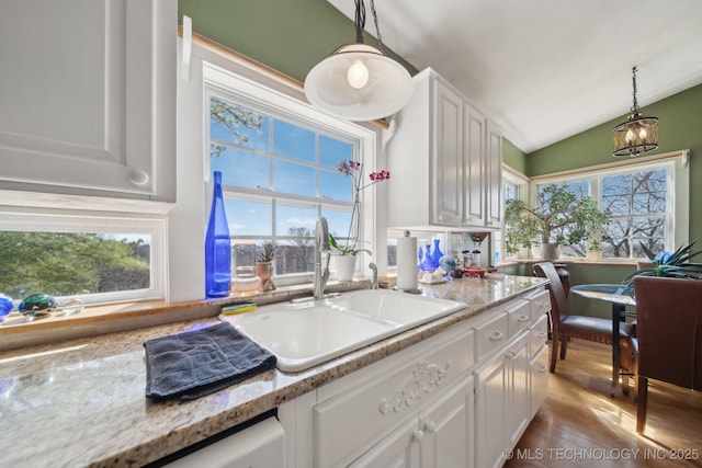 3126 E 490th Rd, Pryor, OK 74361 - kitchen featuring a sink, a wealth of natural light, white cabinets, and lofted ceiling