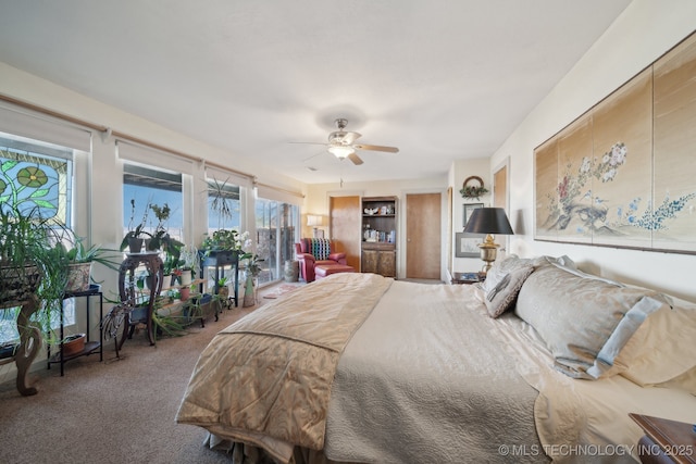 3126 E 490th Rd, Pryor, OK 74361 - bedroom featuring carpet floors and ceiling fan