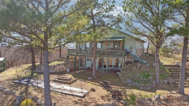 3126 E 490th Rd, Pryor, OK 74361 - rear view of house featuring a wooden deck and stairway