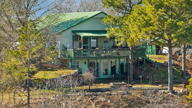 3126 E 490th Rd, Pryor, OK 74361 - view of front facade with a wooden deck, metal roof, and stairway