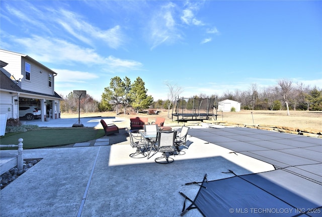 view of patio / terrace with a trampoline