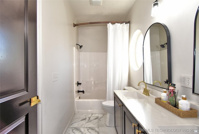 full bath featuring marble finish floor, toilet, shower / bath combo, vanity, and baseboards