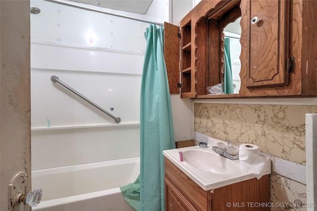 bathroom featuring vanity and shower / tub combo with curtain