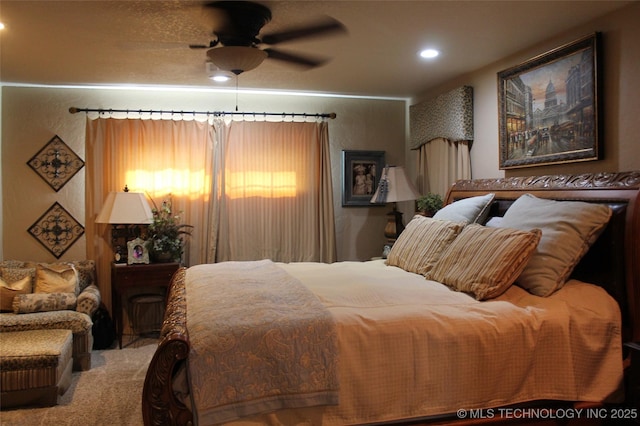 carpeted bedroom with recessed lighting