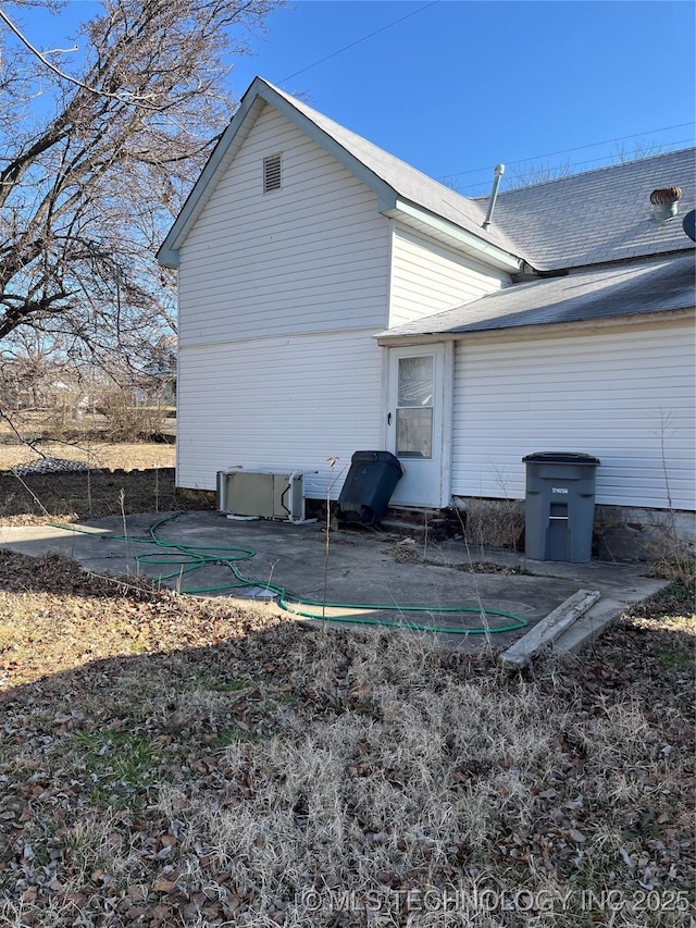 rear view of house with a patio area