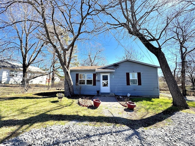 view of front of property with a front lawn