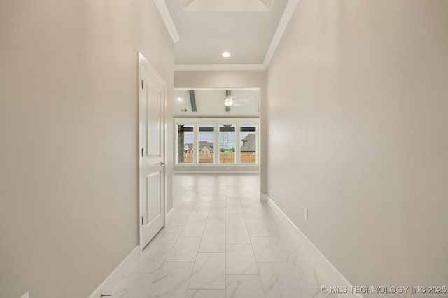 hallway with recessed lighting, baseboards, ornamental molding, and marble finish floor