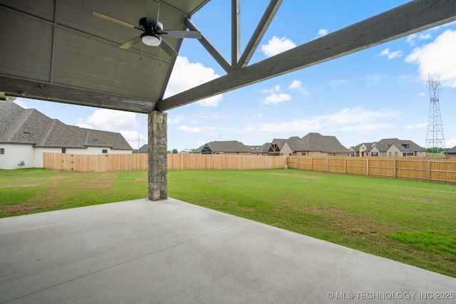 view of patio featuring a fenced backyard and a ceiling fan