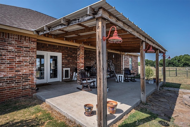 view of patio / terrace with fence and french doors