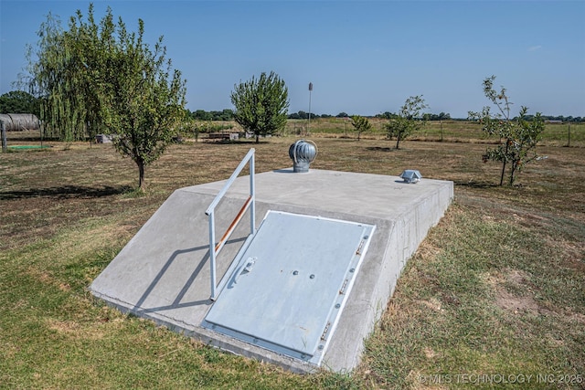 entry to storm shelter with a lawn