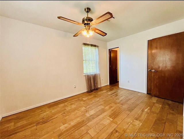 unfurnished bedroom with baseboards, ceiling fan, and light wood finished floors