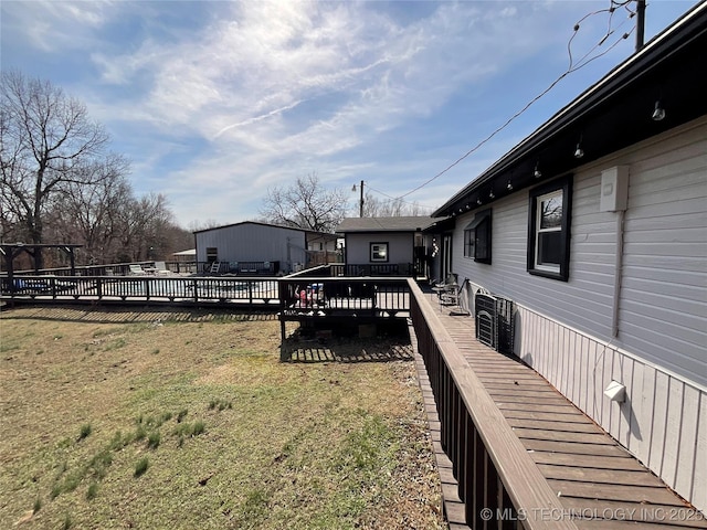 view of yard featuring a wooden deck