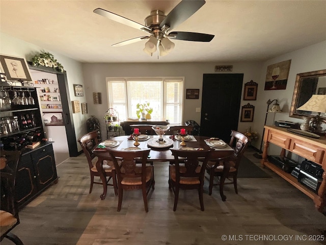 dining room with a ceiling fan