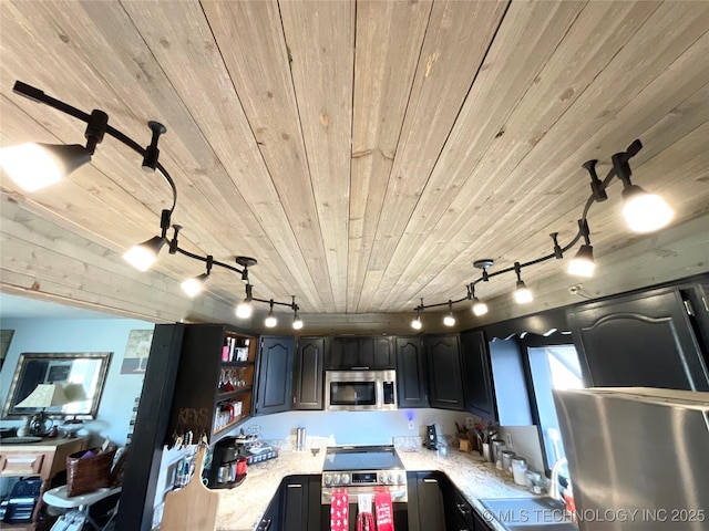 kitchen with wooden ceiling, appliances with stainless steel finishes, open shelves, and a sink