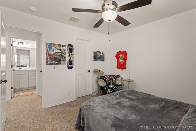 bedroom with light carpet, ceiling fan, and visible vents