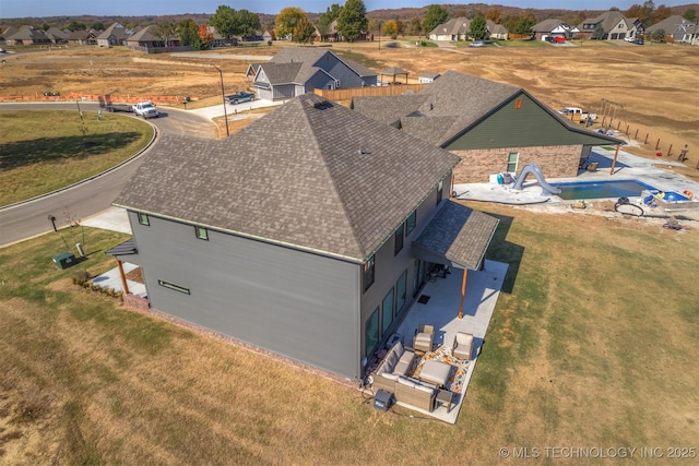 drone / aerial view featuring a residential view