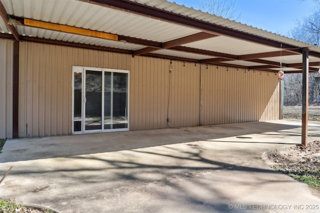 view of patio / terrace featuring a carport