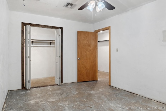 unfurnished bedroom with ceiling fan, visible vents, unfinished concrete flooring, and a closet