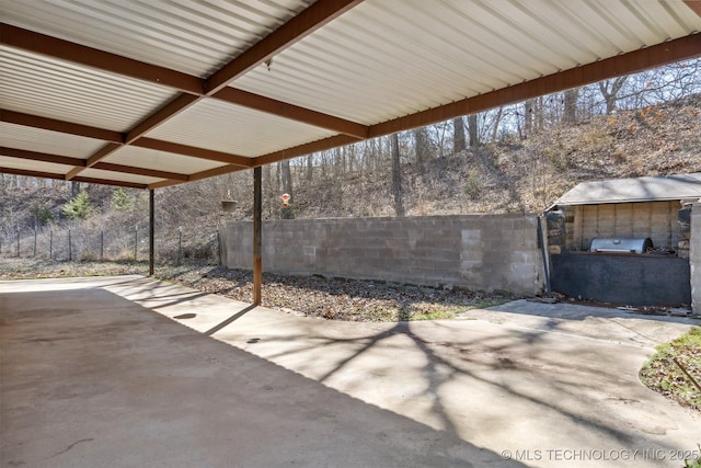 view of patio / terrace featuring fence