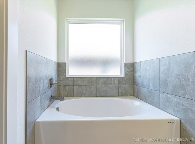 full bathroom with a garden tub