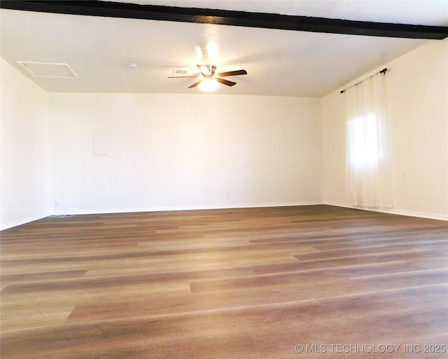 unfurnished room with beam ceiling, a ceiling fan, baseboards, and wood finished floors