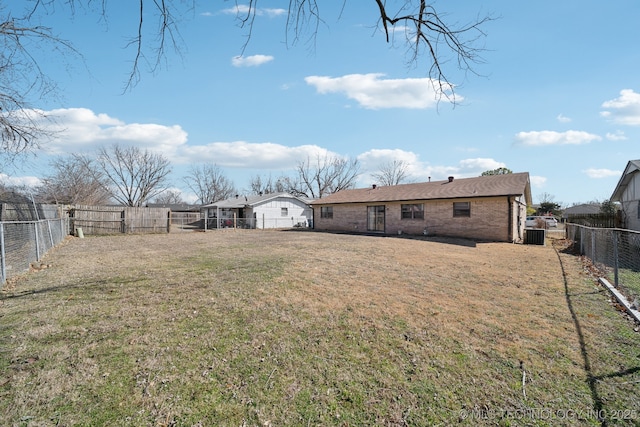 view of yard with a fenced backyard