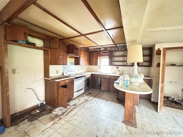 kitchen featuring light floors, open shelves, light countertops, white electric range, and a peninsula