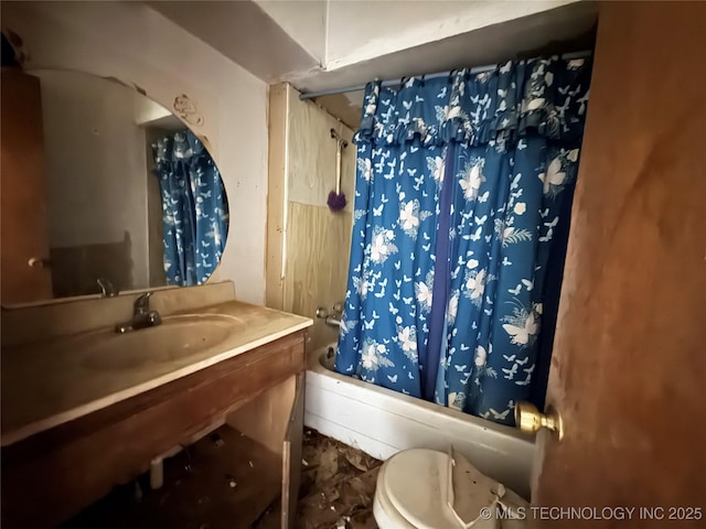 bathroom featuring shower / tub combo with curtain and vanity