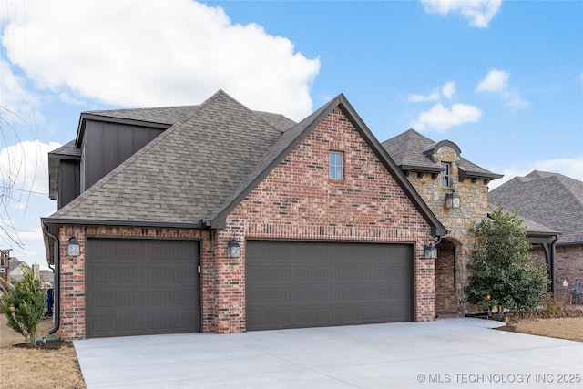 view of front of home featuring concrete driveway, brick siding, roof with shingles, and an attached garage