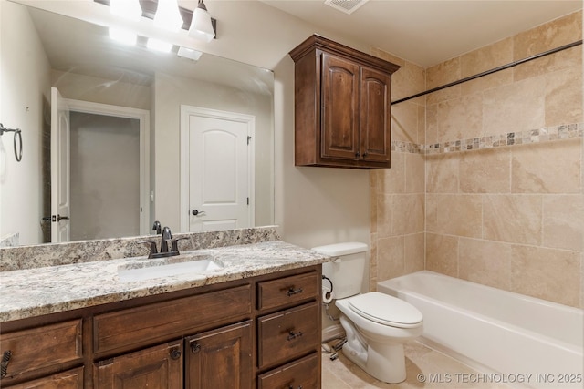 full bathroom featuring toilet, bathtub / shower combination, visible vents, and vanity